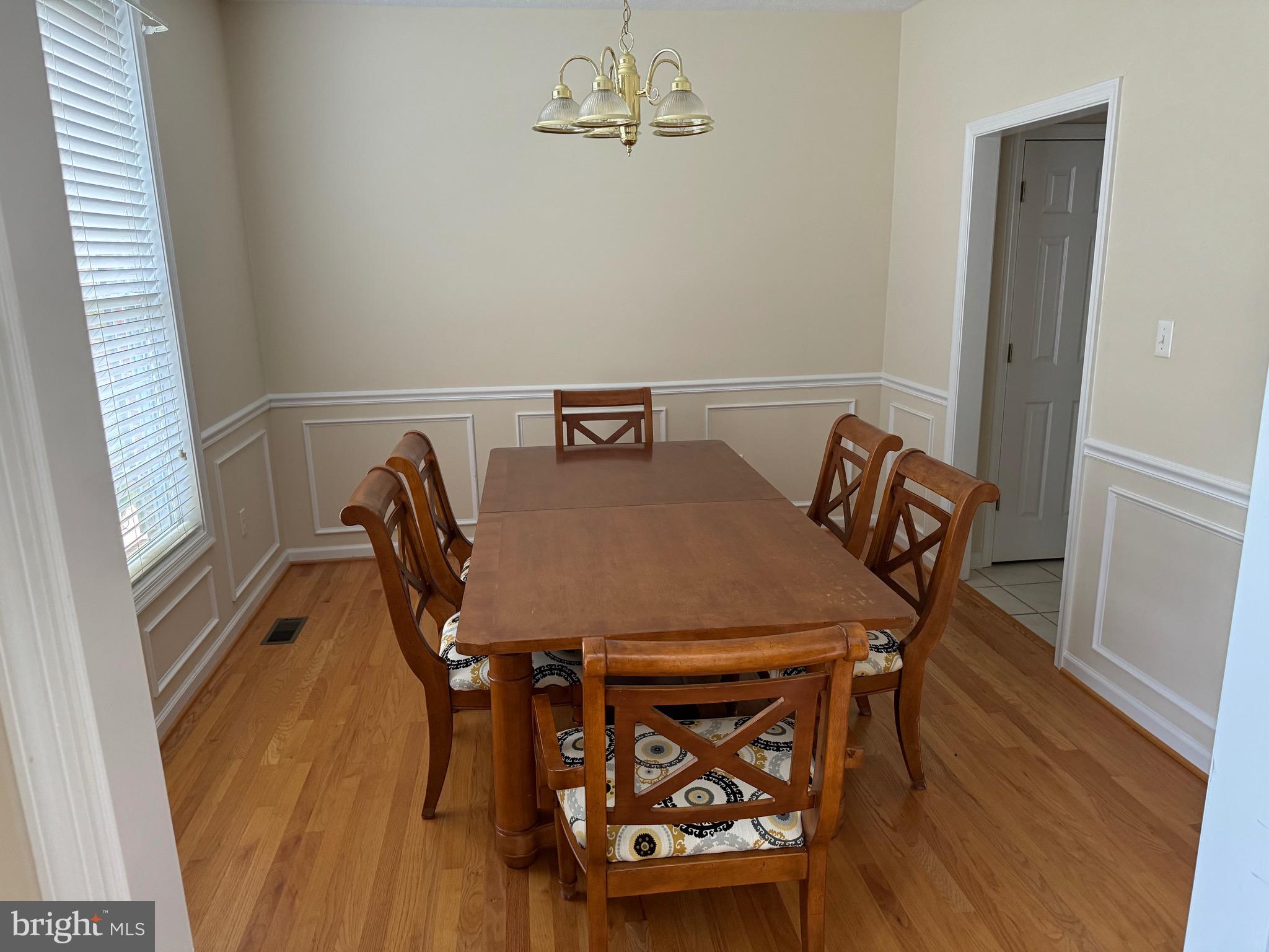 115 Gloucester Road Front Royal, VA 22630 - Photo 3 of 14 a view of a dining room with furniture and wooden floor