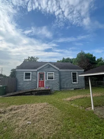 a house view with a garden space