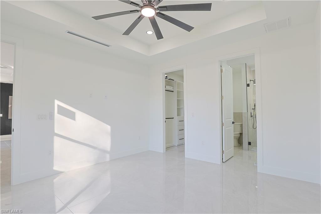 809 Williams Avenue Lehigh Acres, FL 33972 - Photo 9 of 33 wooden floor in an empty room
