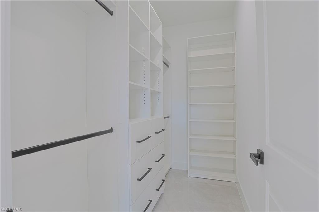 809 Williams Avenue Lehigh Acres, FL 33972 - Photo 13 of 33 a view of walk in closet