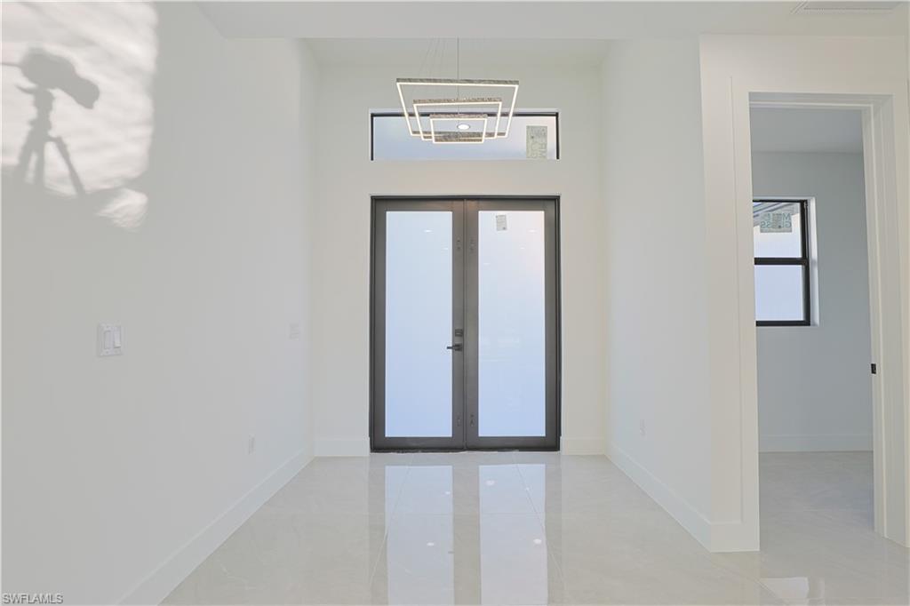 809 Williams Avenue Lehigh Acres, FL 33972 - Photo 20 of 33 a view of front door with a sink