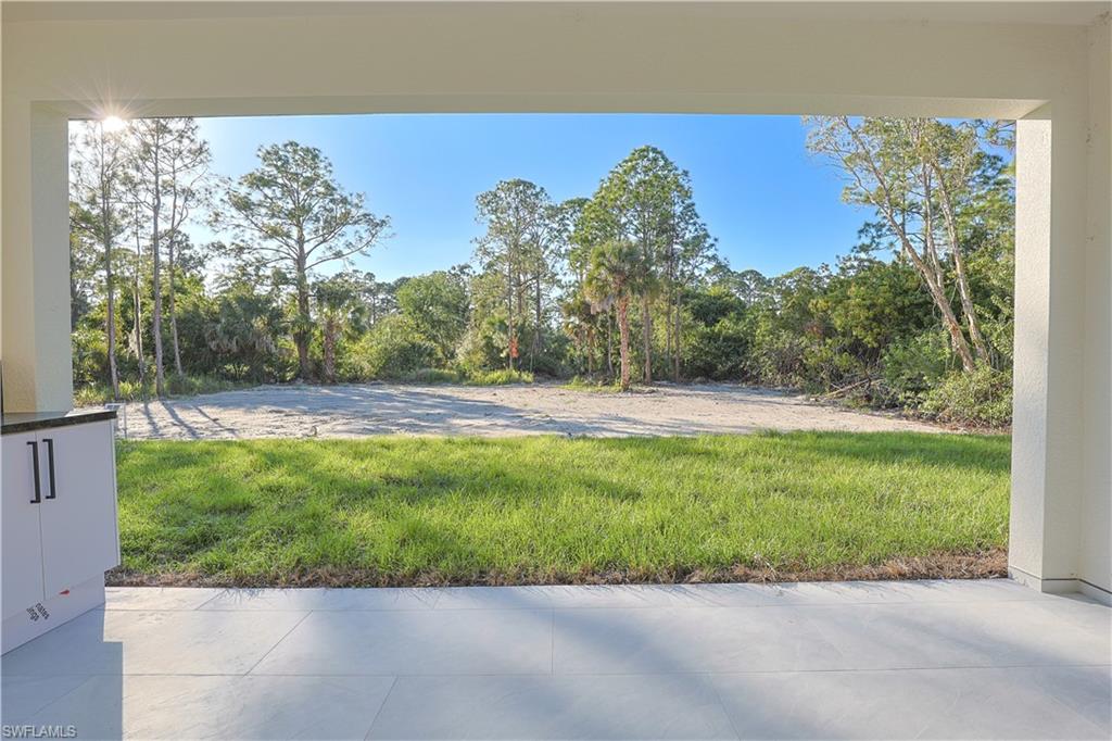 809 Williams Avenue Lehigh Acres, FL 33972 - Photo 23 of 33 a view of a garden