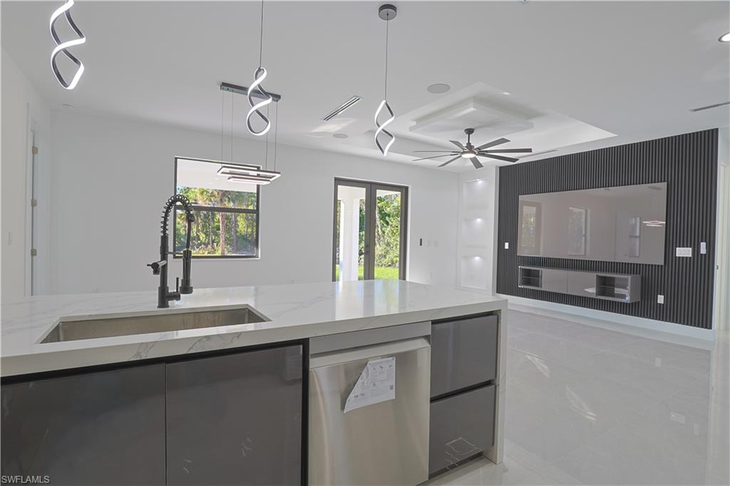 809 Williams Avenue Lehigh Acres, FL 33972 - Photo 32 of 33 a bathroom with a sink and a mirror