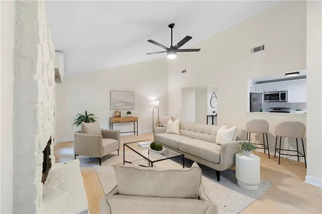 a living room with furniture and a window