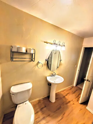 a view of entryway with wooden floor