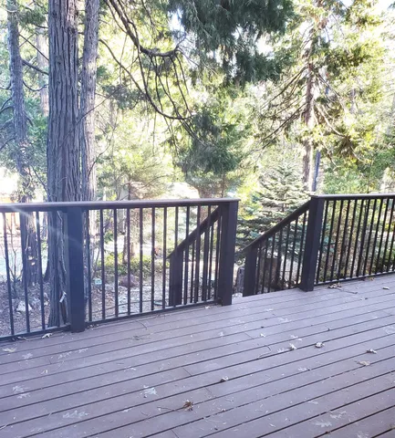 a view of a patio with a bench