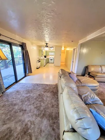 a kitchen with cabinets and stainless steel appliances