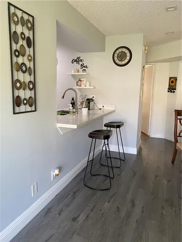 a view of kitchen and microwave