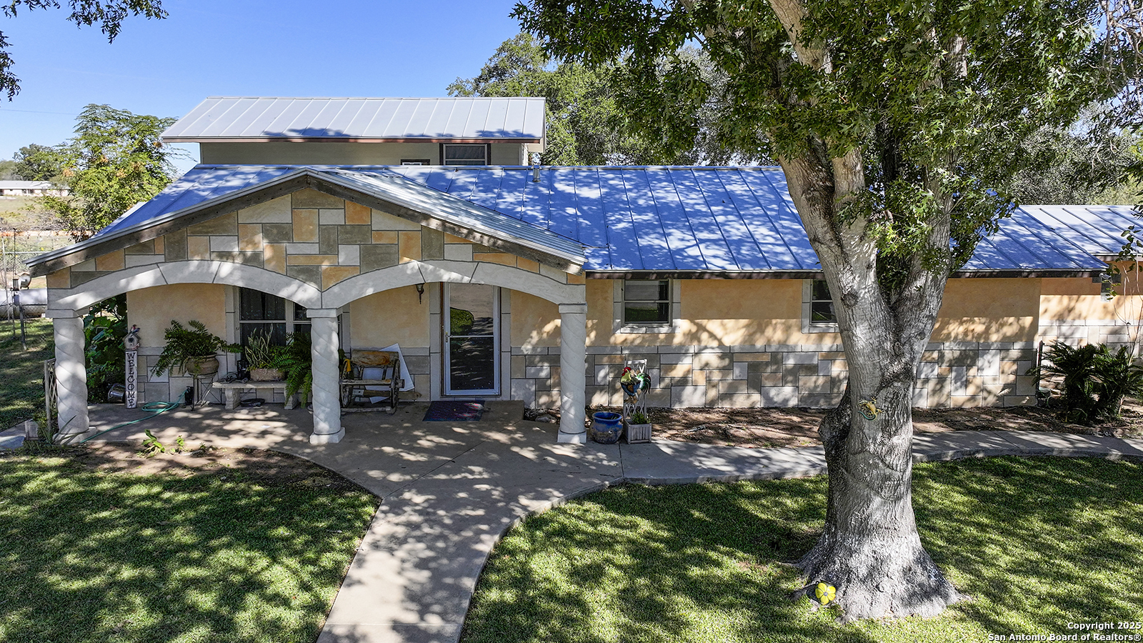 4720 Rakowitz Road Adkins, TX 78101 - Photo 1 of 35 a view of a house with yard and sitting area