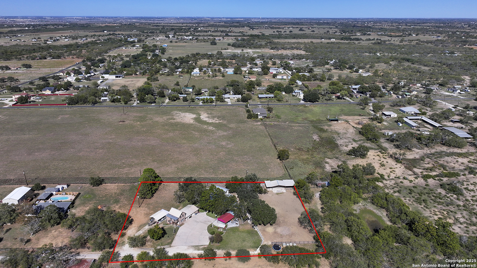 4720 Rakowitz Road Adkins, TX 78101 - Photo 2 of 35 an aerial view of a city