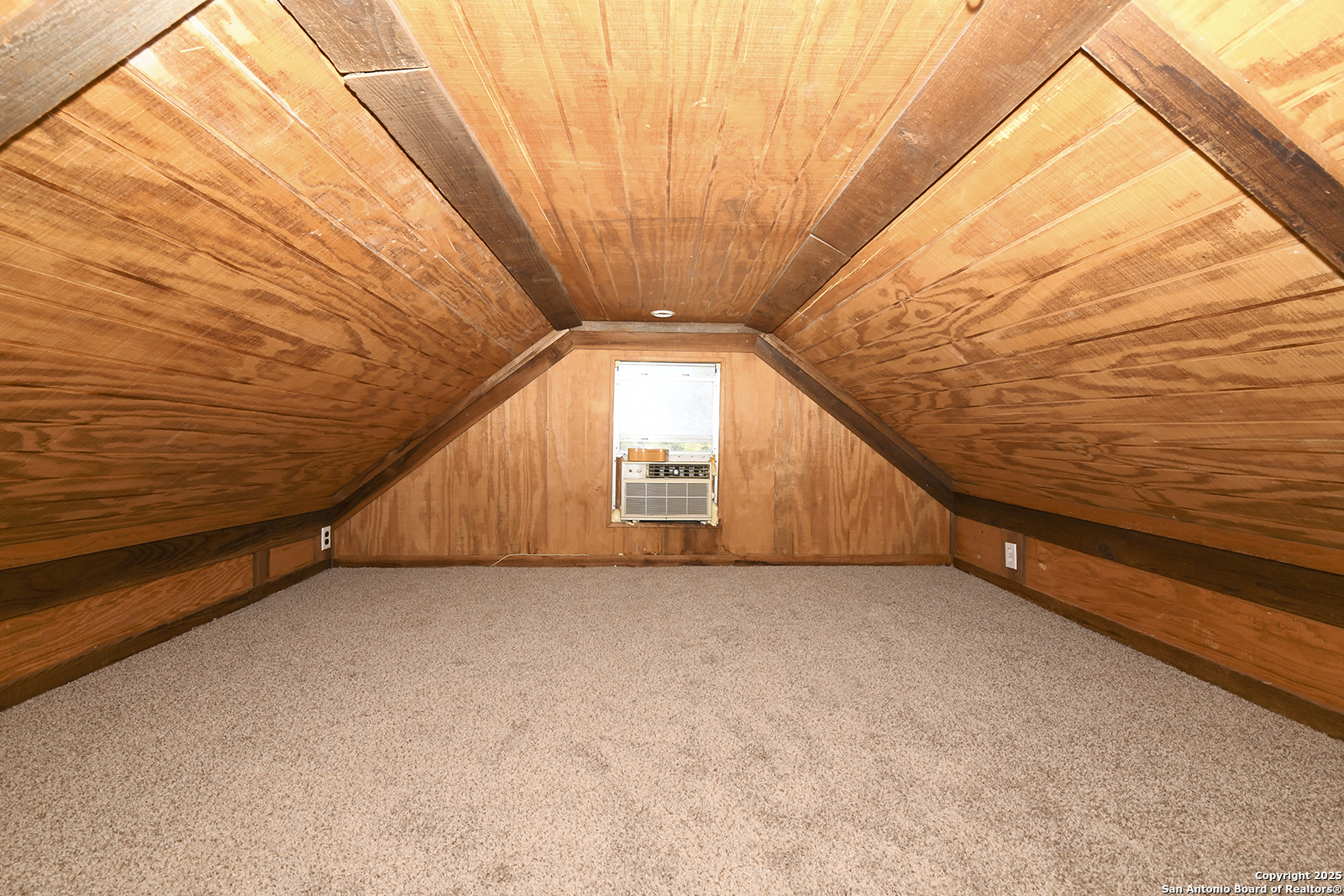 4720 Rakowitz Road Adkins, TX 78101 - Photo 27 of 35 a view of an empty room with windows