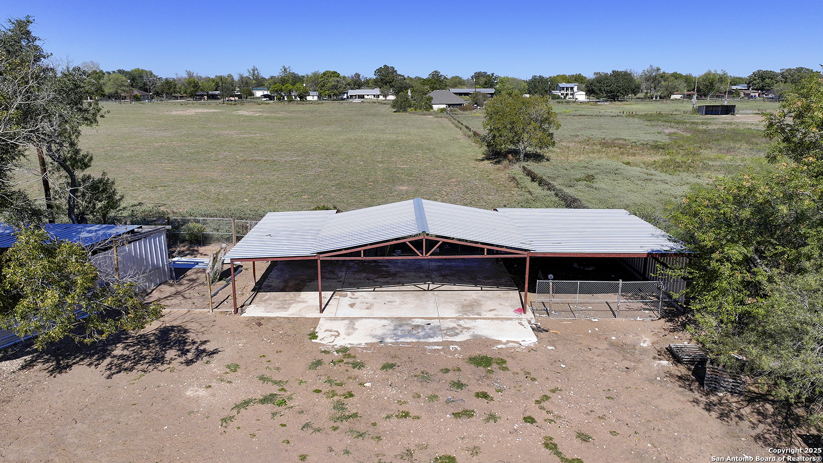 4720 Rakowitz Road Adkins, TX 78101 - Photo 29 of 35 a small pool with lawn chairs