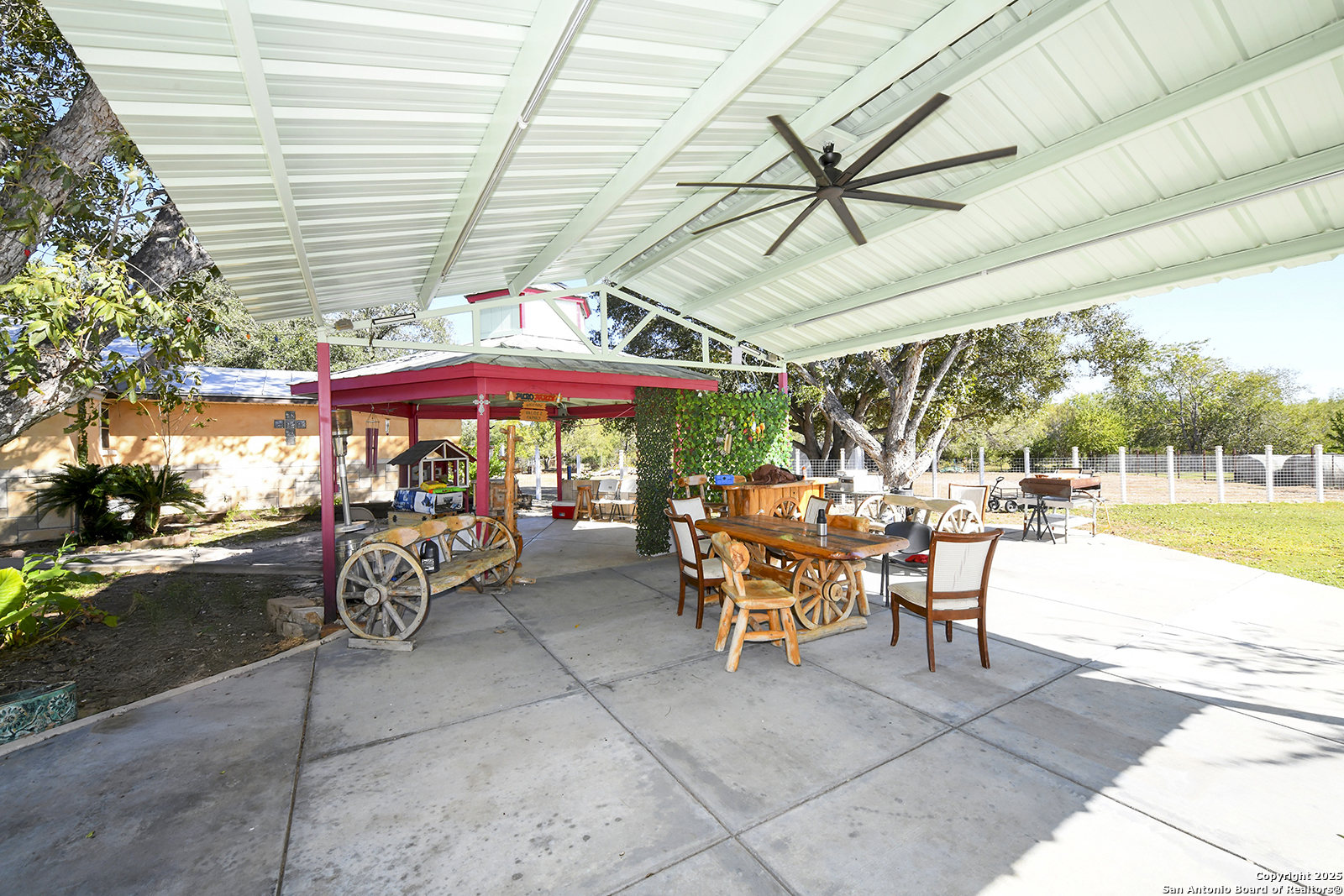 4720 Rakowitz Road Adkins, TX 78101 - Photo 31 of 35 a view of a swimming pool with chairs in patio