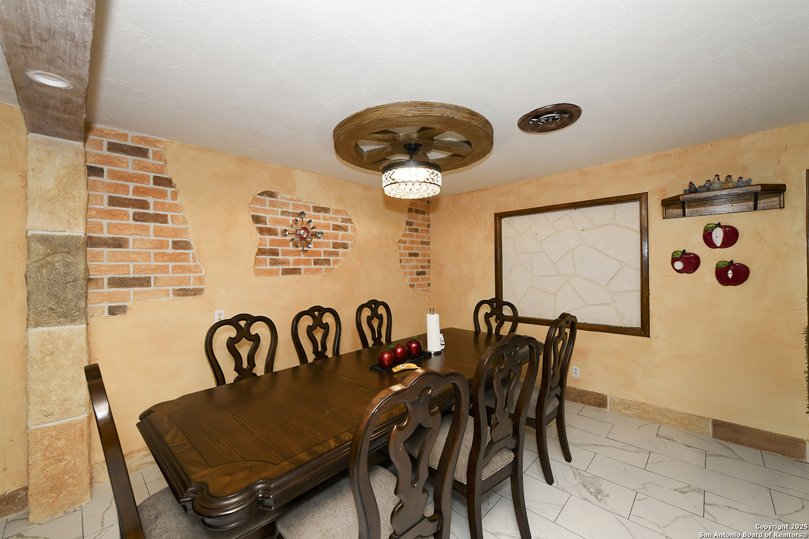 4720 Rakowitz Road Adkins, TX 78101 - Photo 10 of 35 a view of a dining room with furniture and chandelier