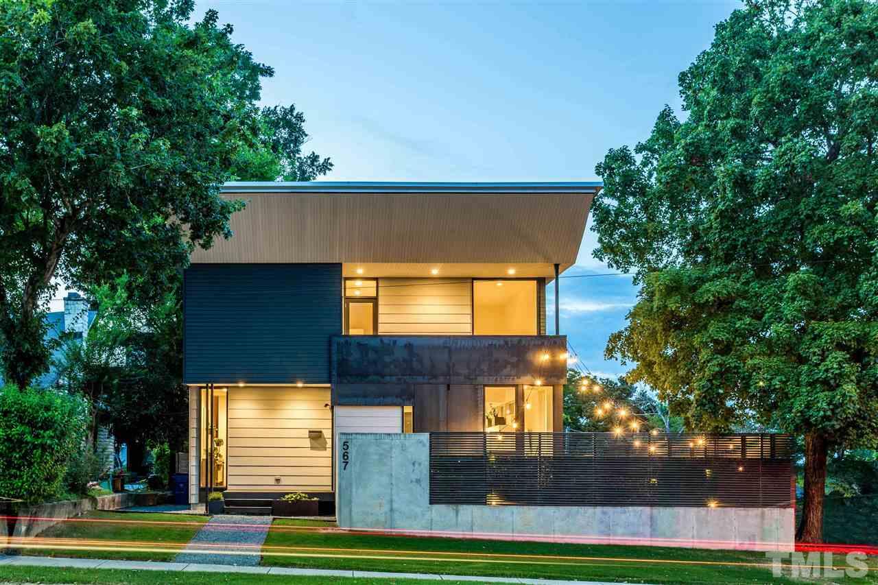 567 New Bern Avenue Raleigh, NC 27601 - Photo 1 of 30 a view of a house with a swimming pool
