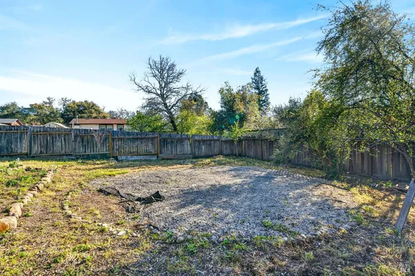 a view of a backyard with green space