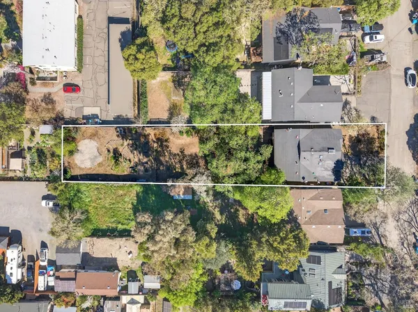 an aerial view of houses and roads