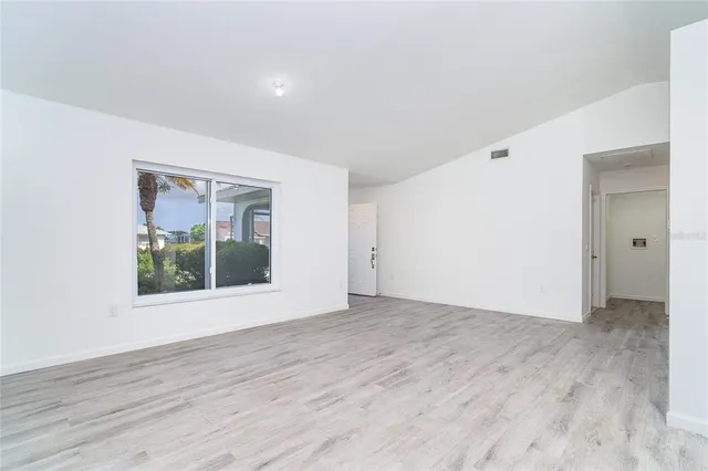 a kitchen with a sink and a window