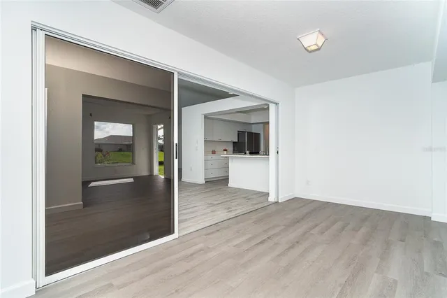 a kitchen with stainless steel appliances a sink stove and refrigerator