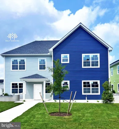 a view of house with a yard