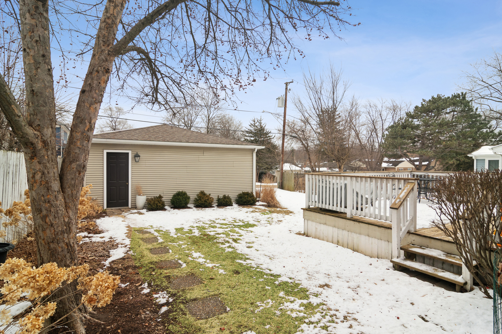 131 Walton Street Barrington, IL 60010 - Photo 20 of 26 a view of a house with snow on the ground