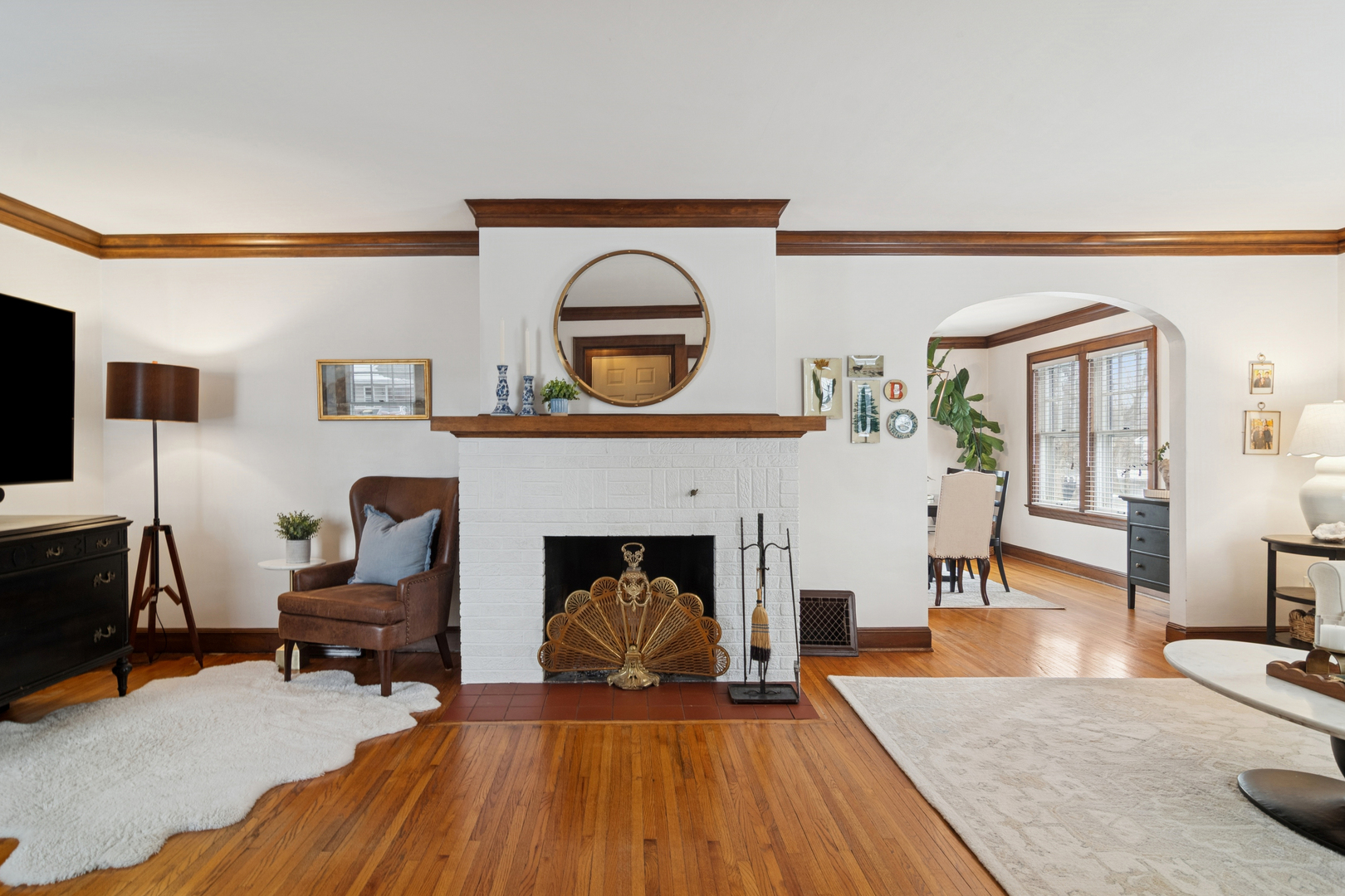 131 Walton Street Barrington, IL 60010 - Photo 2 of 26 a living room with furniture and a fireplace