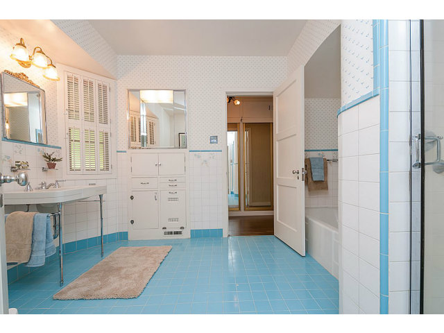 615 Chiltern Road Hillsborough, CA 94010 - Photo 13 of 25 a view of kitchen with cabinets and wooden floor
