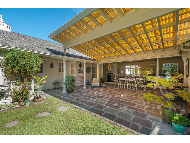 615 Chiltern Road Hillsborough, CA 94010 - Photo 20 of 25 a view of a backyard with a patio