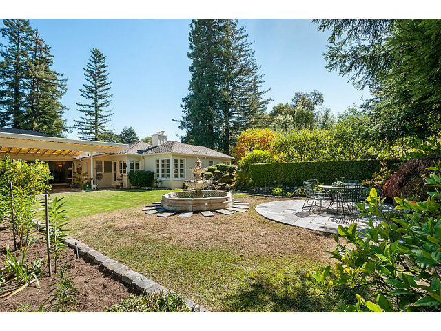 615 Chiltern Road Hillsborough, CA 94010 - Photo 21 of 25 a view of a house with backyard and sitting area