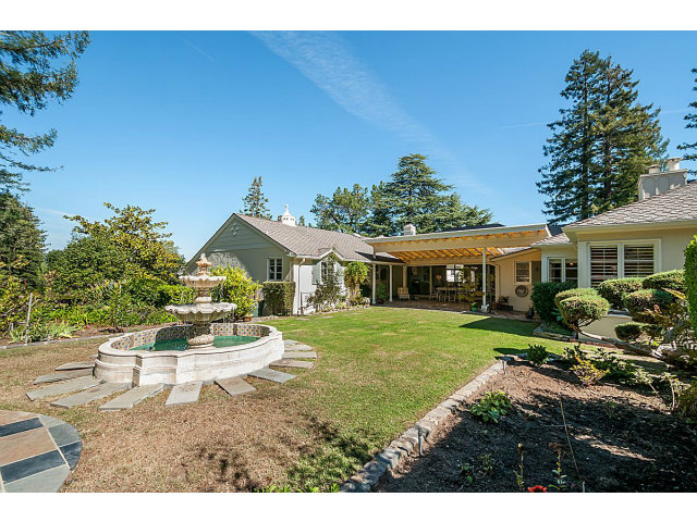 615 Chiltern Road Hillsborough, CA 94010 - Photo 22 of 25 a front view of a house with garden