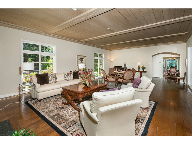 615 Chiltern Road Hillsborough, CA 94010 - Photo 5 of 25 a living room with furniture and a wooden floor