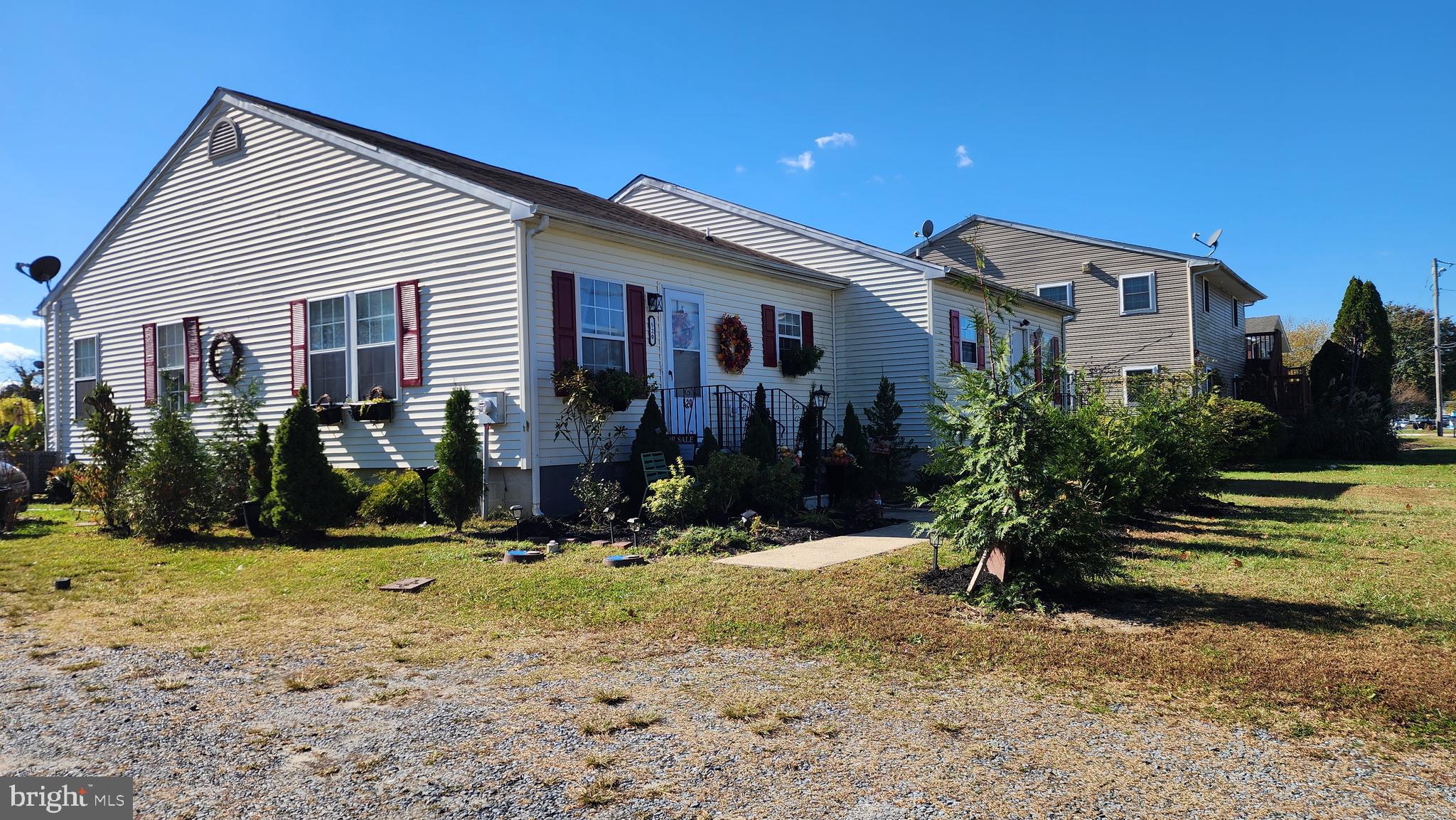 520 Bay Street Berlin, MD 21811 - Photo 21 of 22 a front view of a house with a yard