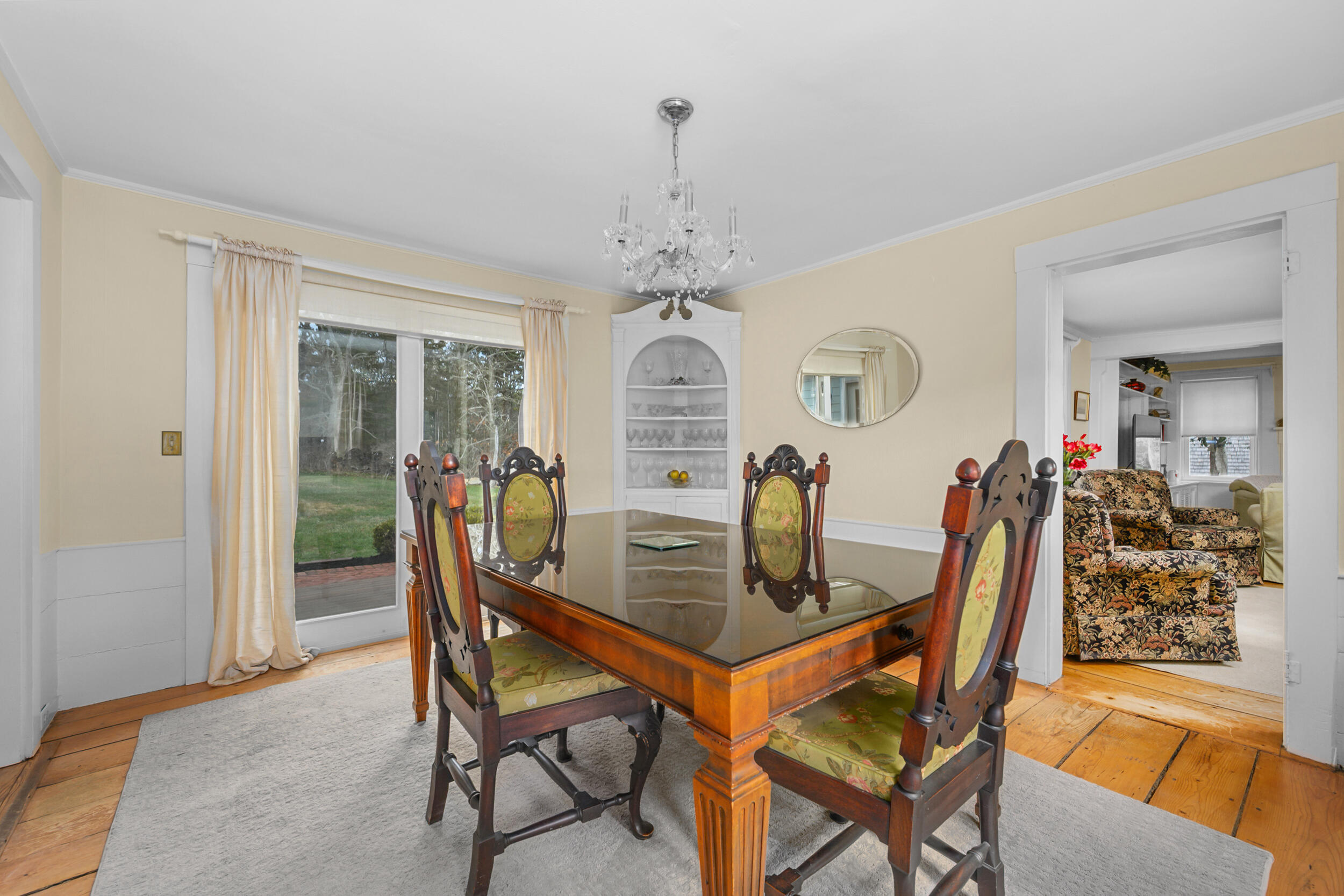 332 South Orleans Road Orleans, MA 02653 - Photo 9 of 42 a view of a dining room with furniture and a chandelier