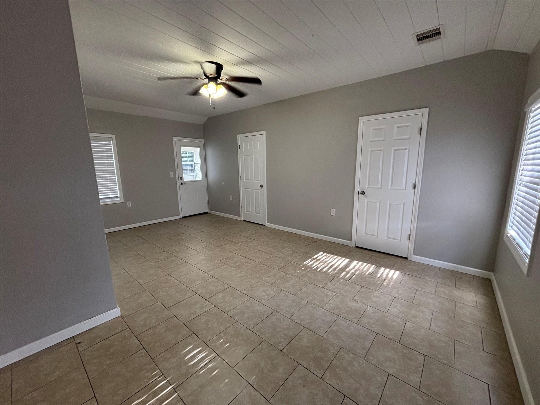 1401 Austin Street La Marque, TX 77568 - Photo 10 of 16 a view of an empty room with a window
