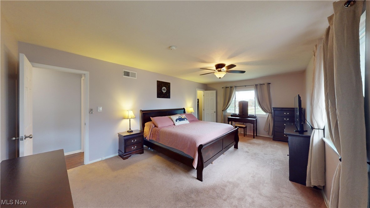 2630 Call Road Stow, OH 44224 - Photo 20 of 37 Carpeted bedroom featuring ceiling fan