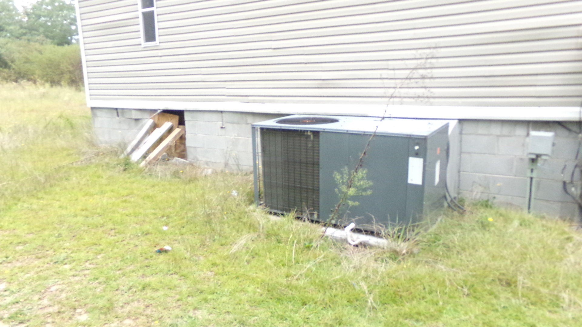 130 Hidden Valley Road Ellerbe, NC 28338 - Photo 14 of 15 HEATING UNIT
