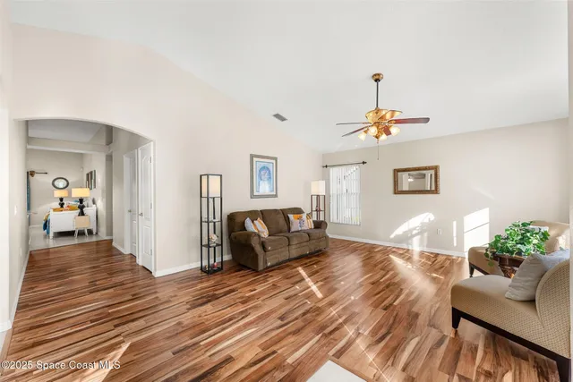 a bathroom with a sink a mirror and a shower