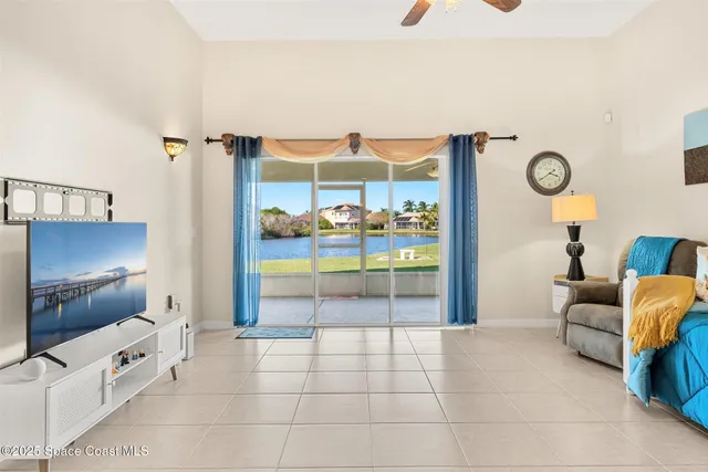 an aerial view of a house with a swimming pool