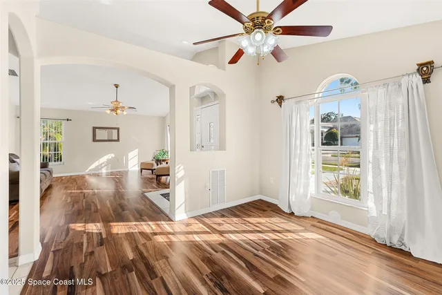 a kitchen with a sink cabinets and window