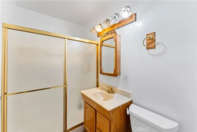 a bathroom with a bath tub with a shower