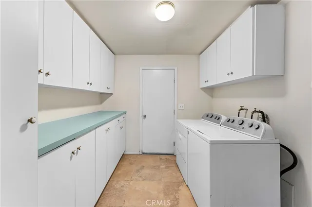 a view of a backyard with a tree