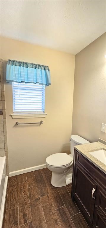 1364 Beagle Road Orange, TX 77632 - Photo 15 of 25 a bathroom with a sink and a toilet
