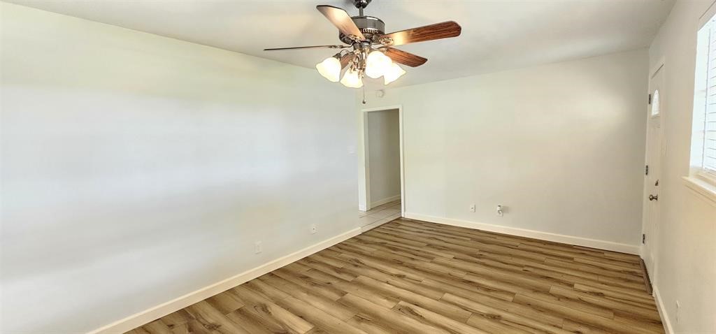 1364 Beagle Road Orange, TX 77632 - Photo 3 of 25 a view of room with window and ceiling fan