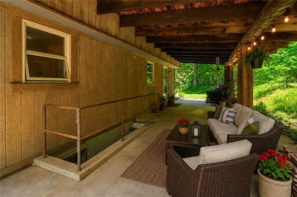 149 Seneca School Road Harmony, PA 16037 - Photo 17 of 50 VIRTUALLY STAGED BACK PATIO AREA!