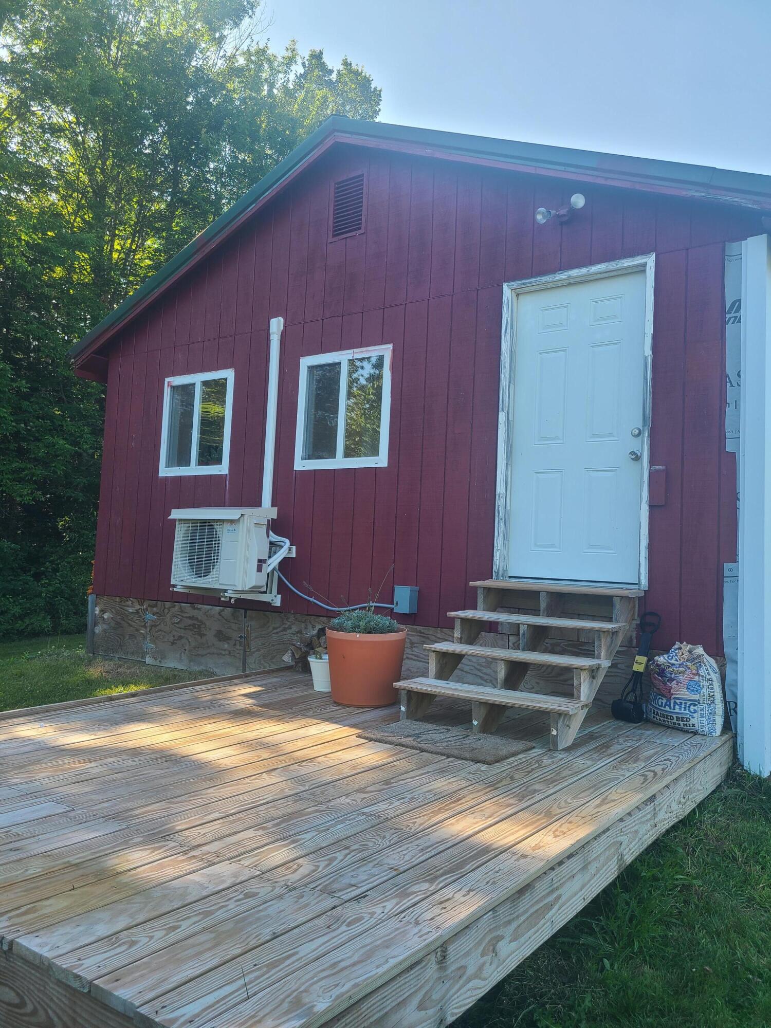 194 Wellington Road Parkman, ME 04443 - Photo 32 of 45 194 Wellington Back Deck Door