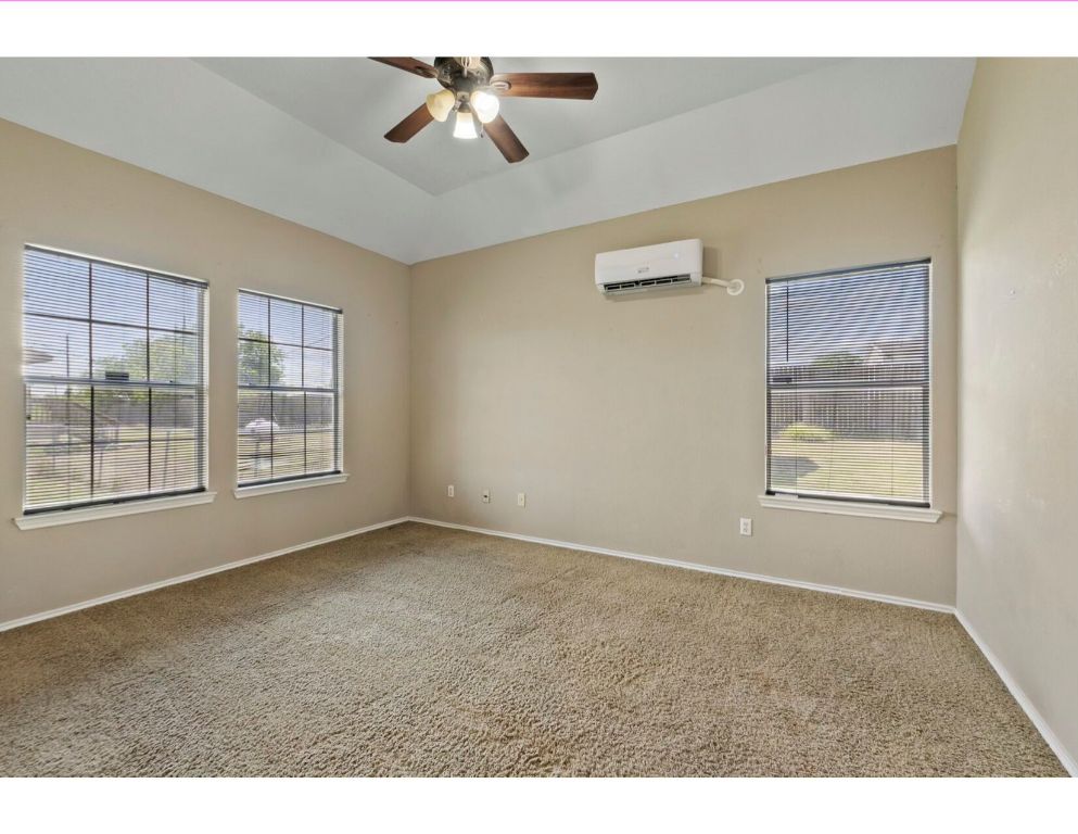 12015 Arnhamn Lane Manor, TX 78653 - Photo 22 of 35 a view of an empty room with a window