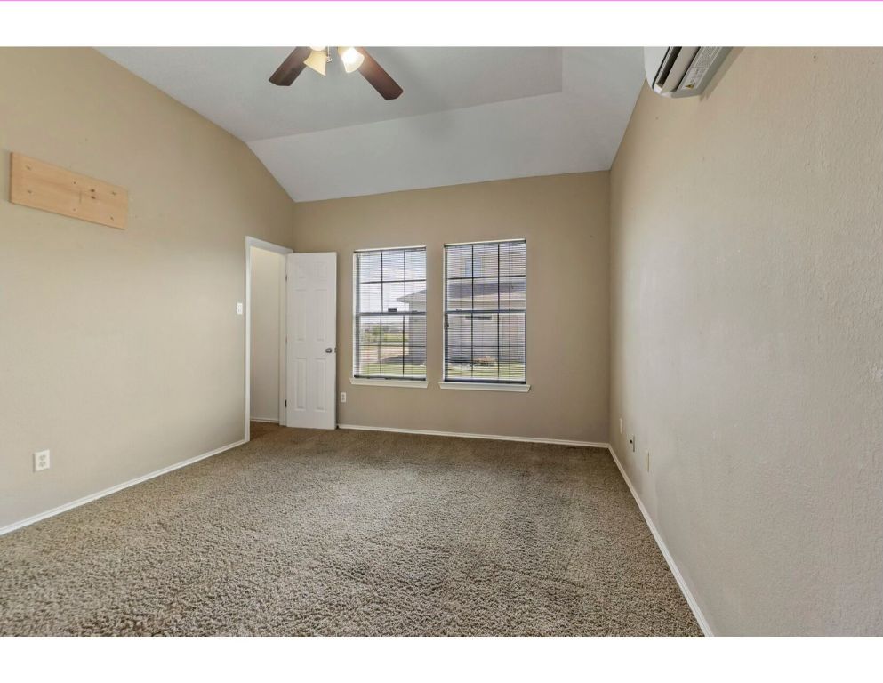 12015 Arnhamn Lane Manor, TX 78653 - Photo 23 of 35 a view of an empty room with a window