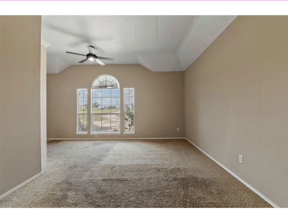 12015 Arnhamn Lane Manor, TX 78653 - Photo 28 of 35 a view of an empty room with a window