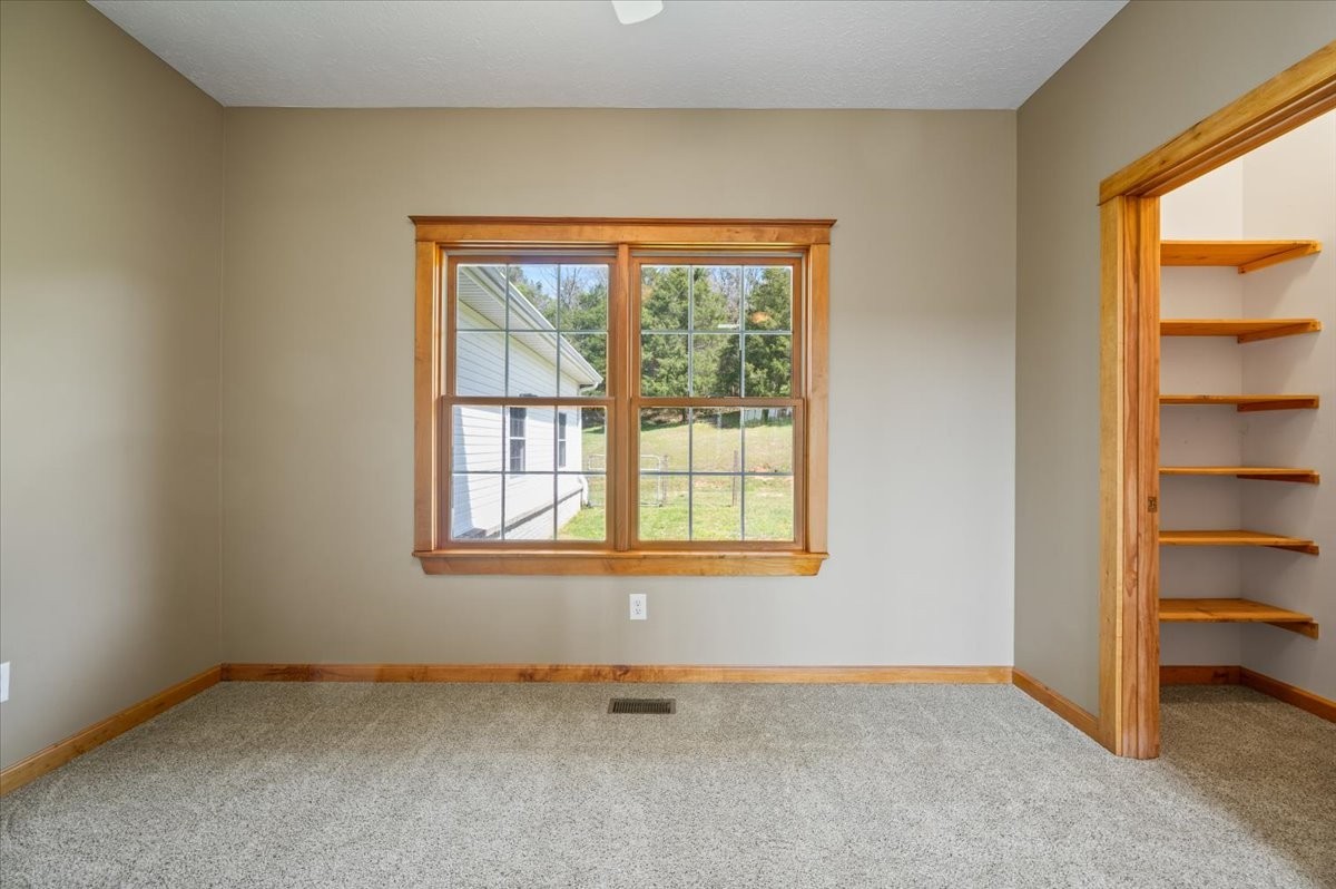 216 Old Wolf Hill Road Bethpage, TN 37022 - Photo 27 of 70 an empty room with a window