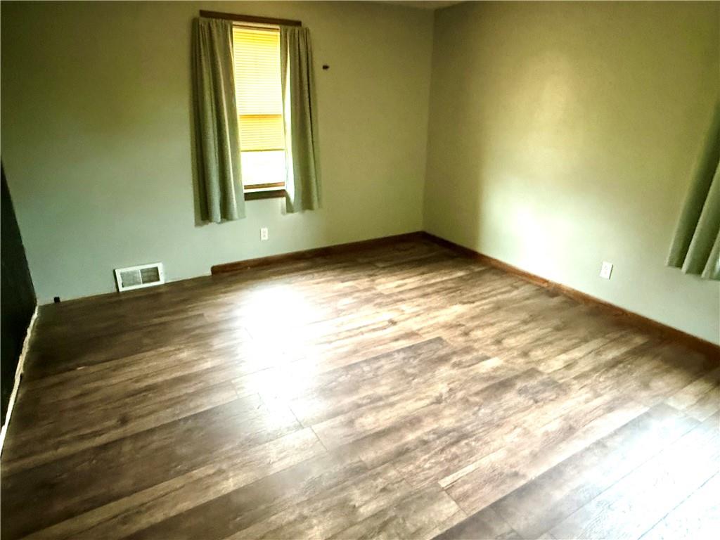 131 Edison Street Uniontown, PA 15401 - Photo 9 of 11 a view of empty room with wooden floor